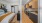 wall separating a kitchen and a bedroom on the other side