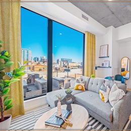 Open space living area with natural lighting